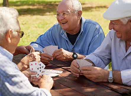 Guys playing cards