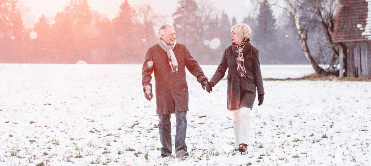 Senior couple walking in winter