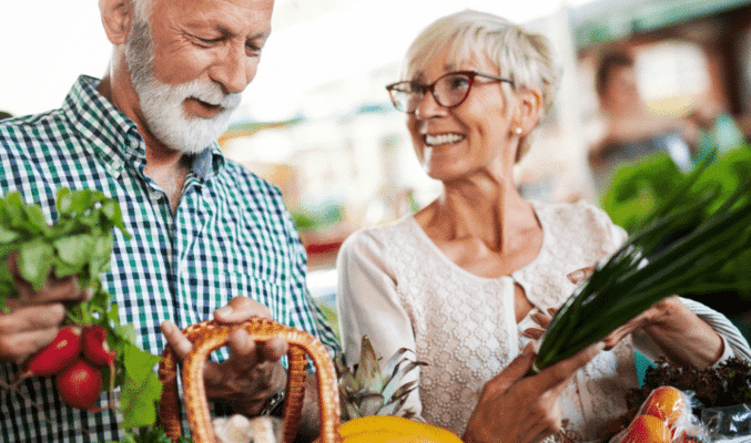 Man and women buying health food