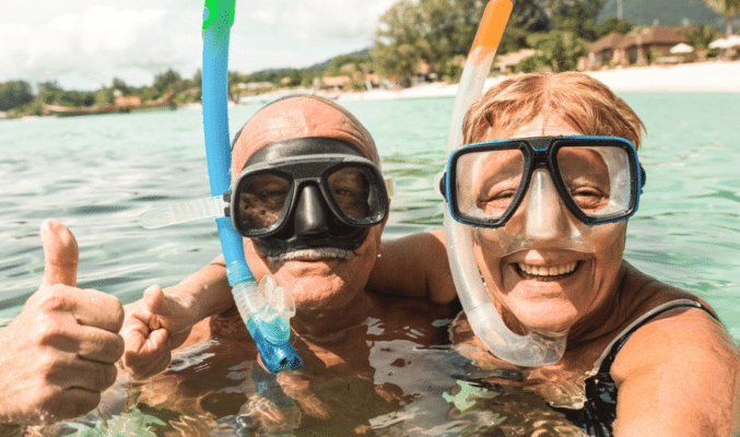 Senior couple swimming