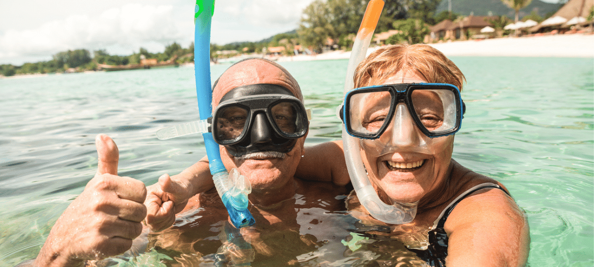 Senior couple swimming