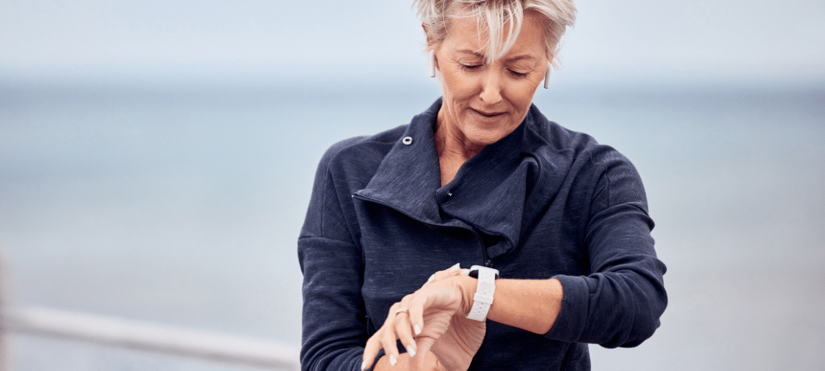 Woman looking at her watch