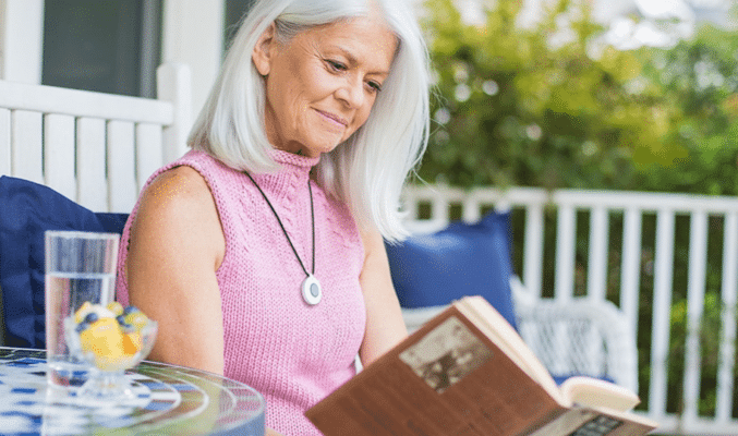 Woman reading on porch