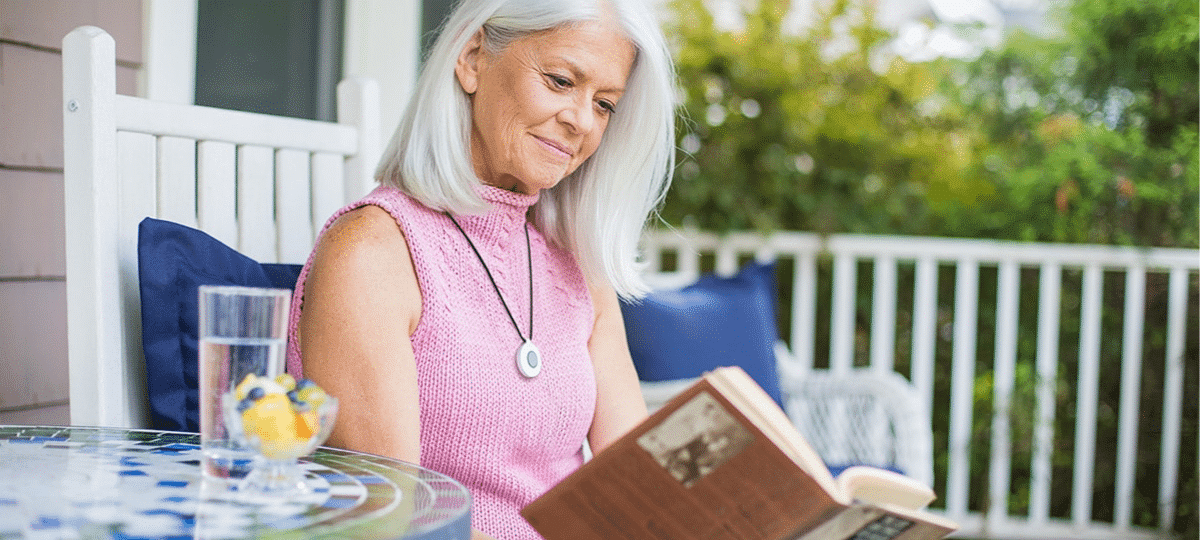 Woman reading on porch