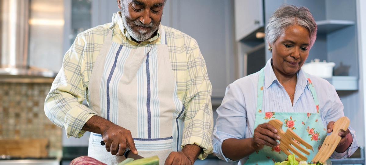 Couple Making Salads