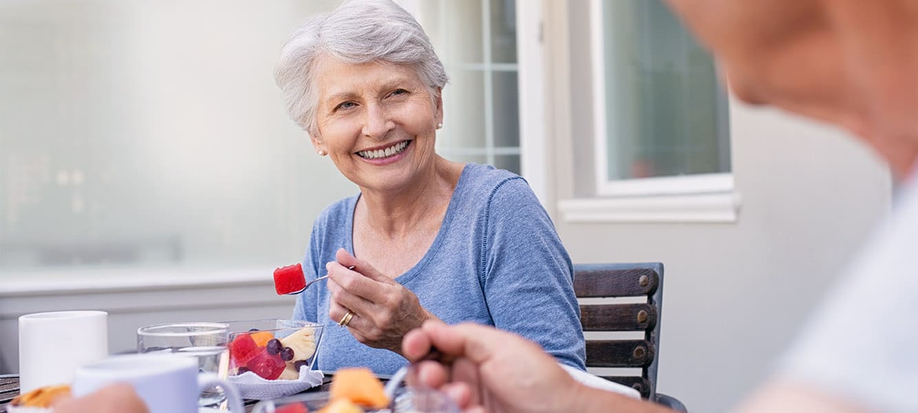 Woman Eating Healthy Breakfast