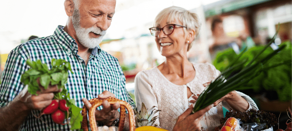 Older Couple Buy Vegetable